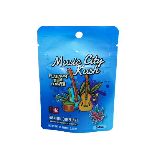 A colorful bag of Music City Kush, featuring guitars and cannabis graphics, labeled as Platinum THCA Flower.