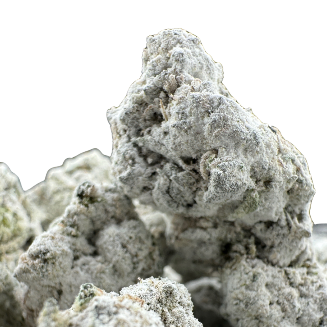 Image of cannabis , lumpy white rocks covered in a fine layer of trichomes.