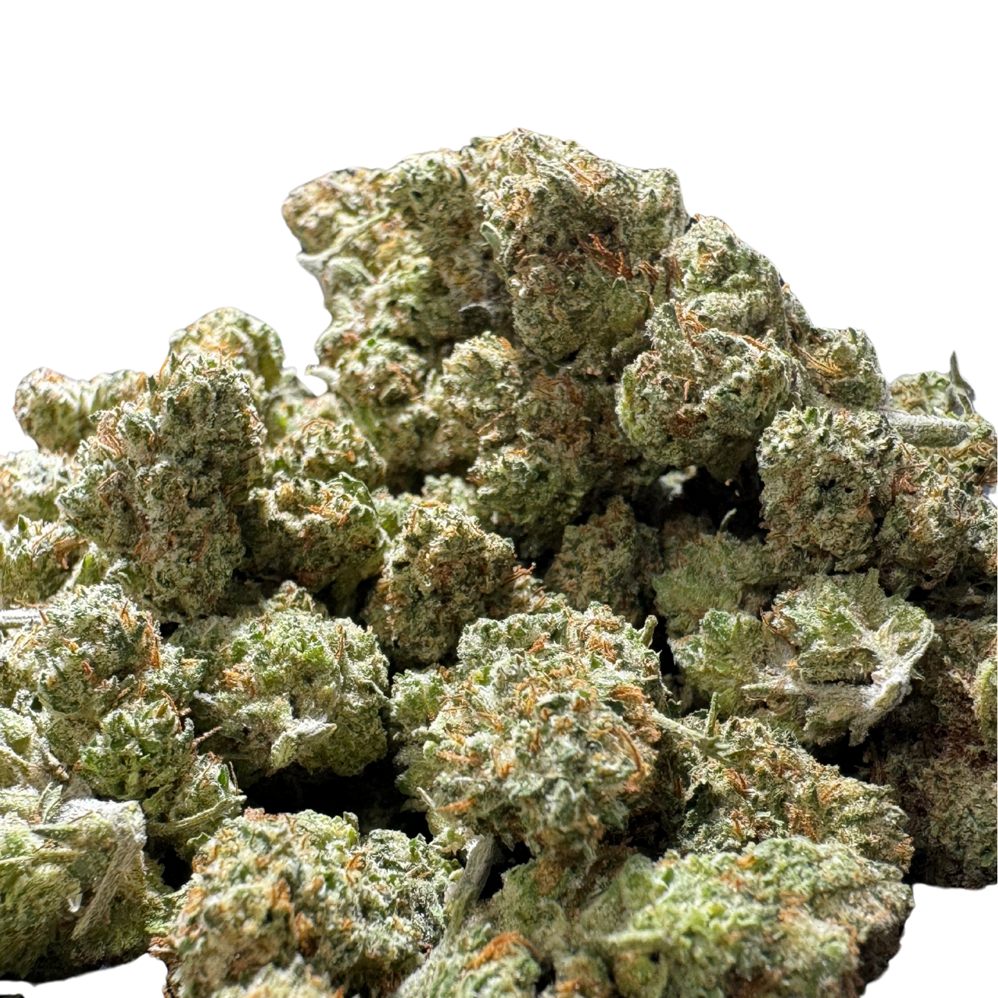 Close-up of a cluster of cannabis buds, featuring dense green leaves and a dusting of trichomes.